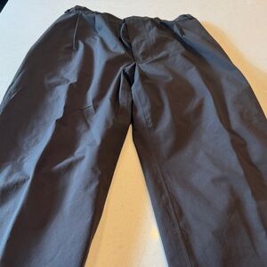 Men's Dark black golf pants gore- Tex small hole back picket see pictures
